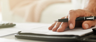 a pen and papers