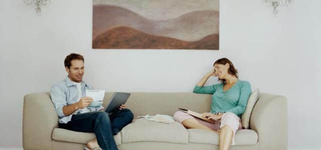 a couple sitting on a couch