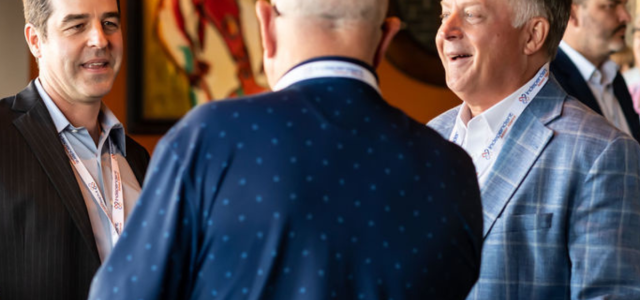 three men talking